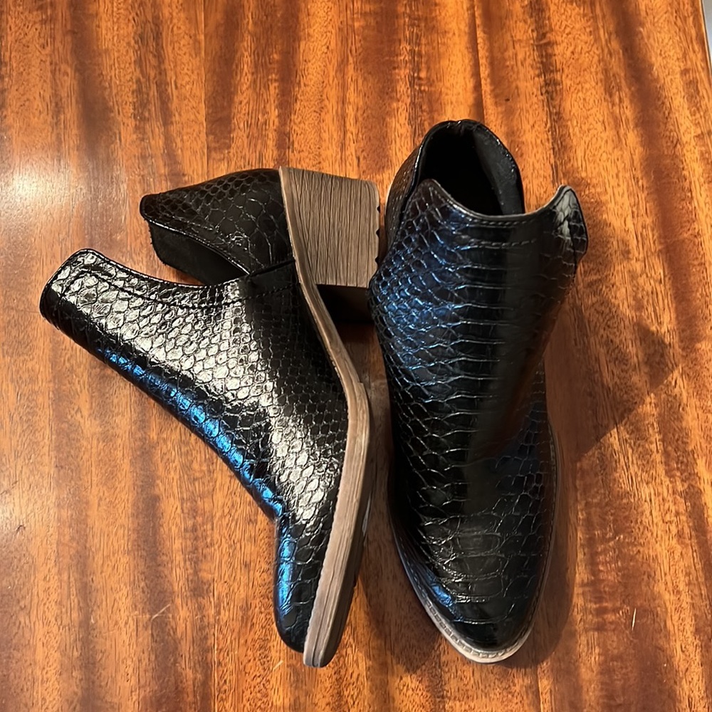 Volatile black booties